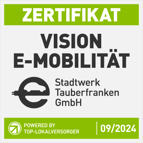 Siegel Vision E-Mobilität Zertifikat 'Vision E-Mobilität' für die Stadtwerk Tauberfranken GmbH, ausgezeichnet als Top-Lokalversorger für E-Mobilität, gültig bis 09/2024. Grünes und graues Design mit E-Auto-Symbol.